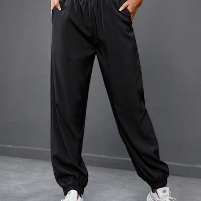 Sport Exploreva – Elastische High-Waist Sporthose mit Taschen für Frauen